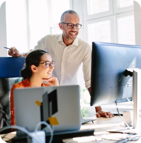 Two Individuals Working Together in an Office Environment